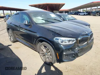 2020 BMW X4 M40i with VIN 5UX2V5C04L9D26548, listed as a IAAI auction lot 42473480 with Not provided miles and . Bid and sale history available at DreamBid. Image 1.