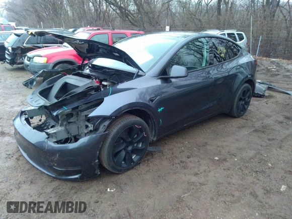 2024 Tesla Model Y Long Range z VIN 7SAYGDEE7RA214802, wystawiony jako IAAI lot #41118623 z przebiegiem 12 336 mil mil oraz . Historia ofert i sprzedaży dostępna na DreamBid. Obrazek 2.