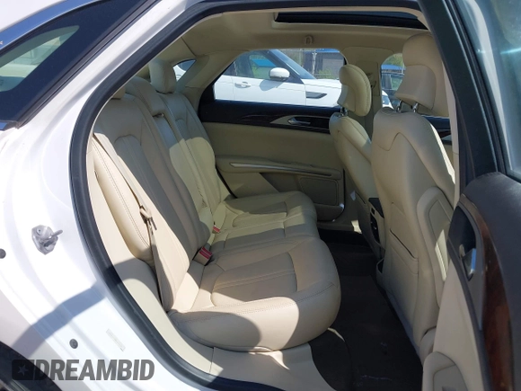 2014 Lincoln MKZ with VIN 3LN6L2J9XER808773, listed as a IAAI auction lot 42112712 with 105,832 mi miles. Bid and sale history available at carsss.com. Image 8.