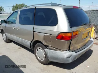 2000 Toyota Sienna LE with VIN 4T3ZF13C9YU201789, listed as a IAAI auction lot 42641248 with 180,781 mi miles and . Bid and sale history available at DreamBid. Image 3.