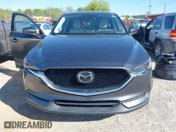 2018 Mazda CX-5 Grand Touring with VIN JM3KFBDM7J0454836, listed as a IAAI auction lot 42001397 with 146,879 mi miles. Bid and sale history available at carsss.com. Image 12.