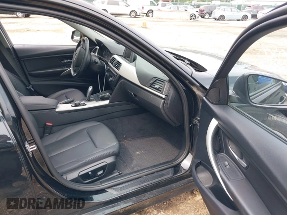2014 BMW 3 Series 320i with VIN WBA3B1C52EK135610, listed as a IAAI auction lot 42274086 with 69,536 mi miles and . Bid and sale history available at DreamBid. Image 5.
