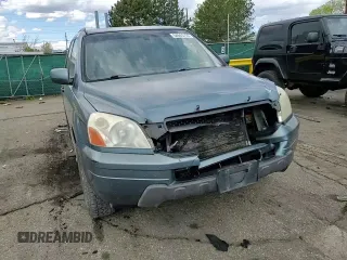 2005 Honda Pilot EX-L z VIN 5FNYF18585B061659, wystawiony jako Copart lot #54946735 z przebiegiem 263 582 mil mil oraz Szkoda całkowita • Salvage title. Historia ofert i sprzedaży dostępna na DreamBid. Obrazek 12.
