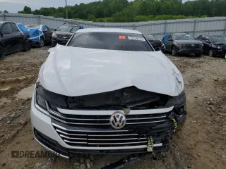 2019 Volkswagen Arteon SE z VIN WVWBR7AN1KE000435, wystawiony jako Copart lot #55991645 z przebiegiem 70 285 mil mil oraz Czysty tytuł • Clean title. Historia ofert i sprzedaży dostępna na DreamBid. Obrazek 5.
