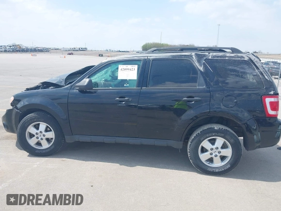 2012 Ford Escape XLT z VIN 1FMCU9DG0CKA83804, wystawiony jako IAAI lot #42099423 z przebiegiem Nie podano mil oraz . Historia ofert i sprzedaży dostępna na DreamBid. Obrazek 14.