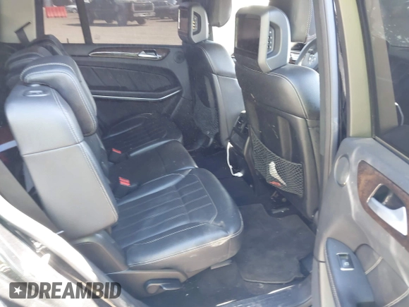 2014 Mercedes-Benz GL 450 with VIN 4JGDF7CE1EA404163, listed as a IAAI auction lot 40596433 with Not provided miles and . Bid and sale history available at DreamBid. Image 8.