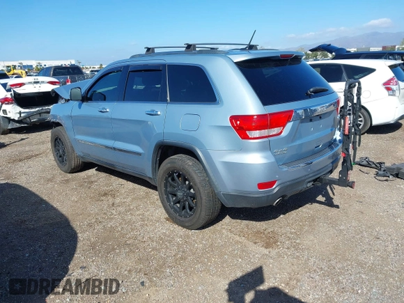 2012 Jeep Grand Cherokee Limited z VIN 1C4RJFBTXCC341813, wystawiony jako IAAI lot #41791662 z przebiegiem 120 811 mil mil oraz . Historia ofert i sprzedaży dostępna na DreamBid. Obrazek 3.