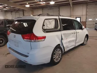 2011 Toyota Sienna XLE AAS with VIN 5TDYK3DC5BS130066, listed as a IAAI auction lot 41294340 with 156,591 mi miles and . Bid and sale history available at DreamBid. Image 4.