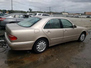 2001 Mercedes-Benz E-Class with VIN WDBJF65J01B389296, listed as a Copart auction lot 71933404 with 124,392 mi miles and Salvage Title. Bid and sale history available at carsss.com. Image 3.