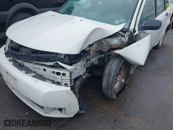 2009 Ford Focus SE z VIN 1FAHP35N19W114402, wystawiony jako IAAI lot #41510501 z przebiegiem Nie podano mil oraz . Historia ofert i sprzedaży dostępna na DreamBid. Obrazek 6.