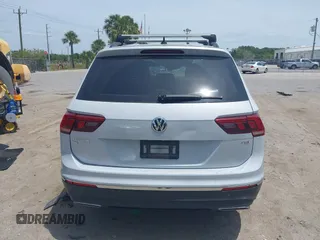 2018 Volkswagen Tiguan SEL with VIN 3VV3B7AX4JM201878, listed as a IAAI auction lot 42083809 with 115,956 mi miles and . Bid and sale history available at DreamBid. Image 17.