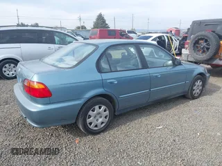 2000 Honda Civic VP z VIN 2HGEJ6618YH521482, wystawiony jako IAAI lot #41940776 z przebiegiem 77 745 mil mil oraz . Historia ofert i sprzedaży dostępna na DreamBid. Obrazek 4.