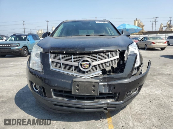 2012 Cadillac SRX Luxury Collection z VIN 3GYFNAE38CS638136, wystawiony jako Copart lot #60292655 z przebiegiem 124 569 mil mil oraz Szkoda całkowita • Salvage title. Historia ofert i sprzedaży dostępna na DreamBid. Obrazek 5.