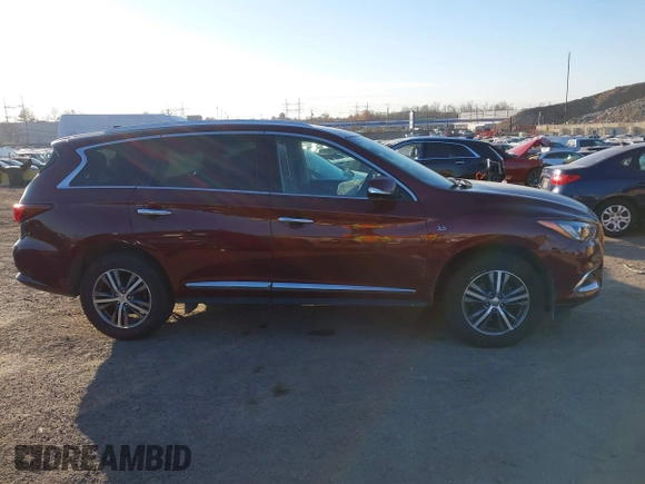 2020 Infiniti QX60 Luxe with VIN 5N1DL0MM0LC511566, listed as a IAAI auction lot 40879519 with 90,479 mi miles and . Bid and sale history available at DreamBid. Image 13.