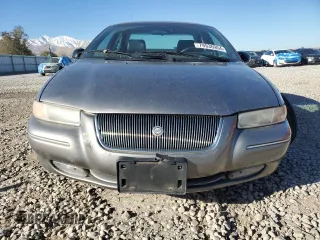 1998 Chrysler Cirrus LXi z VIN 1C3EJ56H4WN236597, wystawiony jako Copart lot #79936954 z przebiegiem 118 555 mil mil oraz Szkody całkowita. Historia ofert i sprzedaży dostępna na DreamBid. Obrazek 5.