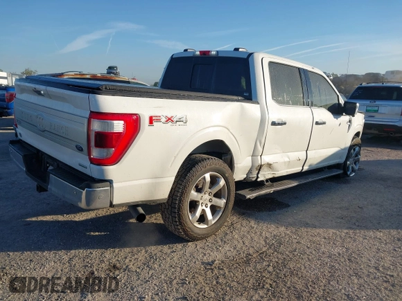 2021 Ford F-150 XL with VIN 1FTFW1E89MFB34411, listed as a IAAI auction lot 41832911 with 70,702 mi miles. Bid and sale history available at carsss.com. Image 4.
