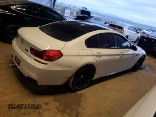 2015 BMW M6 z VIN WBS6C9C59FD467571, wystawiony jako Copart lot #85105724 z przebiegiem 128 295 mil mil oraz Czysty tytuł • Clean title. Historia ofert i sprzedaży dostępna na DreamBid. Obrazek 3.