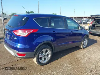 2014 Ford Escape SE with VIN 1FMCU0GX8EUA69910, listed as a IAAI auction lot 42174164 with 194,628 mi miles and . Bid and sale history available at DreamBid. Image 4.
