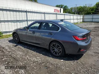 2021 BMW 3 Series 330i xDrive with VIN WBA5R7C00MFK50404, listed as a Copart auction lot 56010064 with 22,905 mi miles. Bid and sale history available at carsss.com. Image 2.
