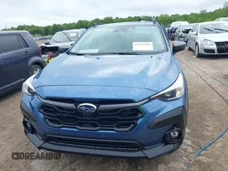 2024 Subaru Crosstrek Premium z VIN JF2GUADC6RH338290, wystawiony jako IAAI lot #42341194 z przebiegiem 10 379 mil mil oraz . Historia ofert i sprzedaży dostępna na DreamBid. Obrazek 13.
