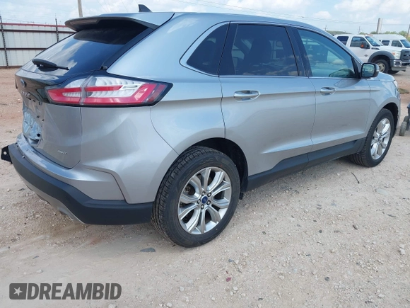 2022 Ford Edge Titanium with VIN 2FMPK4K99NBB06136, listed as a IAAI auction lot 42733977 with 57,794 mi miles and . Bid and sale history available at DreamBid. Image 4.