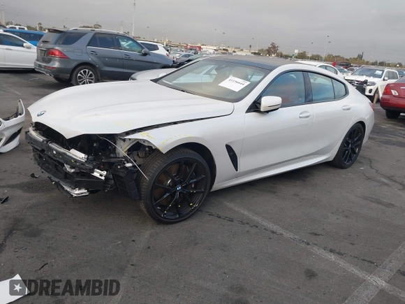 2023 BMW 8 Series 840i z VIN WBAGV2C02PCL77961, wystawiony jako IAAI lot #41156644 z przebiegiem 7059 mil mil oraz . Historia ofert i sprzedaży dostępna na DreamBid. Obrazek 2.
