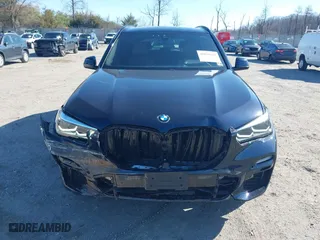 2021 BMW X5 xDrive40i with VIN 5UXCR6C09M9F83785, listed as a IAAI auction lot 41828697 with 57,863 mi miles. Bid and sale history available at carsss.com. Image 12.