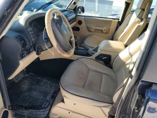 2004 Land Rover Discovery SE with VIN SALTY19464A867638, listed as a Copart auction lot 43728555 with 239,285 mi miles and Salvage Title. Bid and sale history available at carsss.com. Image 7.