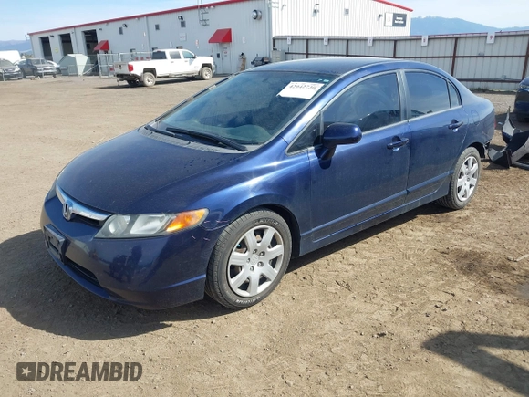 2007 Honda Civic Sdn LX with VIN 1HGFA16587L124463, listed as a IAAI auction lot 42042736 with 189,929 mi miles. Bid and sale history available at carsss.com. Image 2.