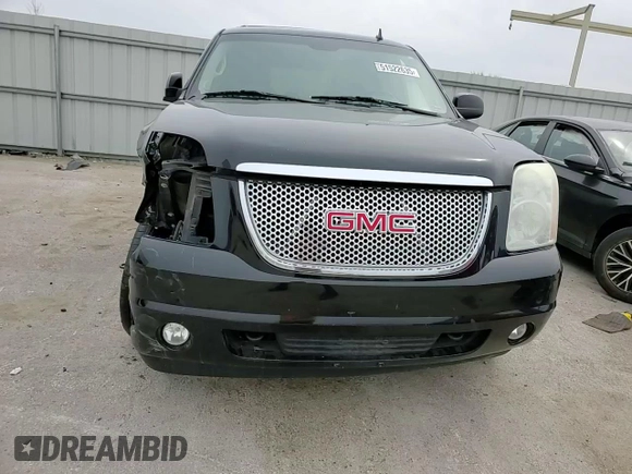 2009 GMC Yukon SLT 4SB with VIN 1GKFK33009R280856, listed as a Copart auction lot 51522635 with 265,941 mi miles and Salvage Title. Bid and sale history available at DreamBid. Image 12.