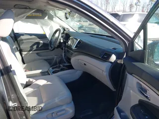 2017 Honda Pilot EX-L with VIN 5FNYF6H59HB101815, listed as a IAAI auction lot 41704661 with 130,479 mi miles and . Bid and sale history available at DreamBid. Image 5.