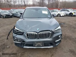 2017 BMW X1 xDrive28i with VIN WBXHT3C35H5F74213, listed as a IAAI auction lot 41589180 with 58,990 mi miles. Bid and sale history available at carsss.com. Image 11.