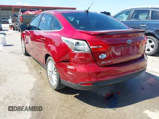 2015 Ford Focus Titanium with VIN 1FADP3J29FL230664, listed as a IAAI auction lot 41870083 with 125,578 mi miles and . Bid and sale history available at DreamBid. Image 6.