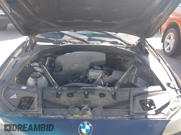 2013 BMW 5 Series 528i with VIN WBAXG5C56DD232046, listed as a IAAI auction lot 41799500 with 114,811 mi miles and . Bid and sale history available at carsss.com. Image 10.