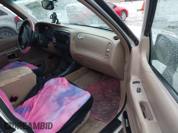 1999 Ford Explorer XLT с VIN 1FMDU35P9XZB21379, выставлен на аукционе IAAI как лот 41496418 с пробегом 265 612 миль миль и . История ставок и продаж доступна на DreamBid. Изображение 5.