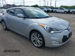 2012 Hyundai Veloster w/Gray Int с VIN KMHTC6AD8CU022989, выставлен на аукционе IAAI как лот 42523328 с пробегом 169 005 миль миль и . История ставок и продаж доступна на DreamBid. Изображение 1.