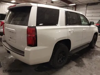2020 Chevrolet Tahoe Commercial with VIN 1GNSKDECXLR260202, listed as a IAAI auction lot 41608712 with 137,214 mi miles. Bid and sale history available at carsss.com. Image 4.