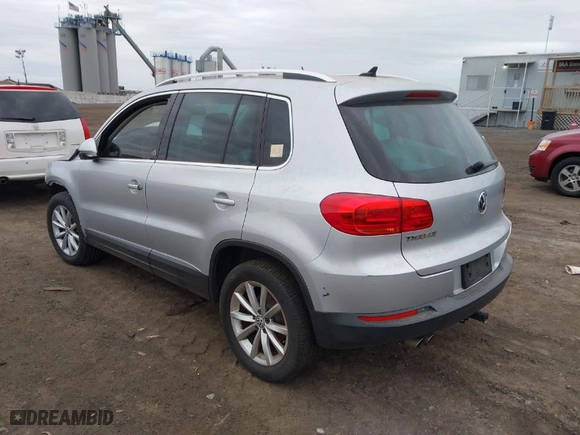 2017 Volkswagen Tiguan Wolfsburg Edition with VIN WVGSV7AX8HK031345, listed as a IAAI auction lot 41348567 with 130,313 mi miles. Bid and sale history available at carsss.com. Image 3.