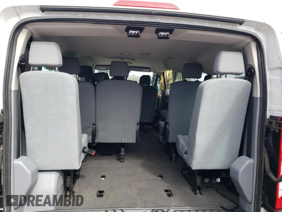 2019 Ford Transit Passenger XL z VIN 1FBZX2ZM4KKB24336, wystawiony jako Copart lot #49377135 z przebiegiem 58 994 mil mil oraz Szkody całkowita. Historia ofert i sprzedaży dostępna na DreamBid. Obrazek 11.