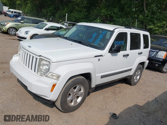 2012 Jeep Liberty Sport with VIN 1C4PJMAK7CW151132, listed as a IAAI auction lot 42418592 with 203,200 mi miles and . Bid and sale history available at DreamBid. Image 2.