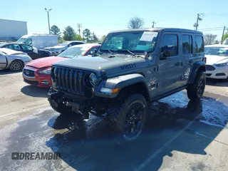 2022 Jeep Wrangler Unlimited Sport S with VIN 1C4HJXDG1NW200793, listed as a IAAI auction lot 41810817 with 35,212 mi miles. Bid and sale history available at carsss.com. Image 19.