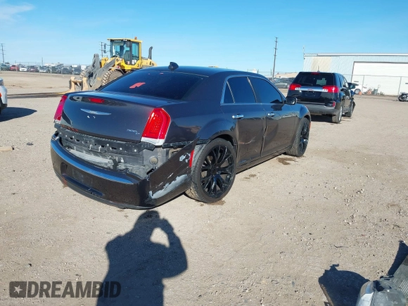 2016 Chrysler 300 with VIN 2C3CCAEG0GH243446, listed as a IAAI auction lot 41376729 with 187,590 mi miles. Bid and sale history available at carsss.com. Image 4.