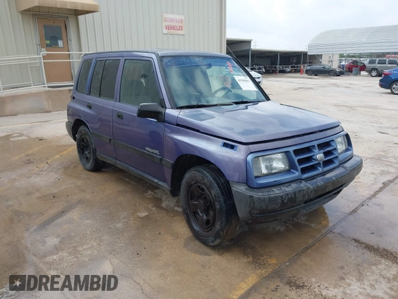 1996 Geo Tracker z VIN 2CNBE1361T6901708, wystawiony jako IAAI lot #41998005 z przebiegiem 223 266 mil mil oraz . Historia ofert i sprzedaży dostępna na DreamBid. Obrazek 1.