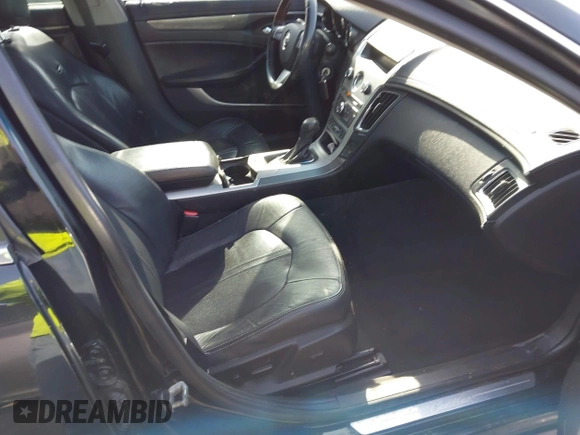 2012 Cadillac CTS with VIN 1G6DM5E39C0106931, listed as a IAAI auction lot 41909732 with 213,319 mi miles and . Bid and sale history available at DreamBid. Image 5.
