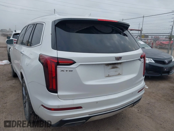 2020 Cadillac XT6 FWD Premium Luxury with VIN 1GYKPCRS2LZ101061, listed as a IAAI auction lot 42113360 with Not provided miles and . Bid and sale history available at DreamBid. Image 3.