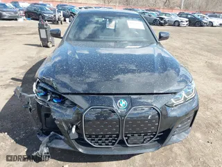 2024 BMW i4 xDrive40 with VIN WBY83FB04RFT19615, listed as a IAAI auction lot 41679918 with 3,883 mi miles. Bid and sale history available at carsss.com. Image 21.