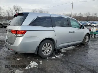 2014 Honda Odyssey EX-L with VIN 5FNRL5H69EB063028, listed as a Copart auction lot 43431935 with 118,426 mi miles and Salvage Title. Bid and sale history available at DreamBid. Image 3.