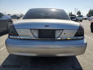 2004 Ford Crown Victoria LX with VIN 2FAFP74W44X184918, listed as a Copart auction lot 73346744 with 157,925 mi miles and Salvage Title. Bid and sale history available at carsss.com. Image 6.