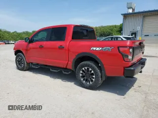 2020 Nissan Titan SL z VIN 1N6AA1ED8LN509339, wystawiony jako Copart lot #54925325 z przebiegiem 88 310 mil mil oraz Szkody całkowita. Historia ofert i sprzedaży dostępna na DreamBid. Obrazek 2.