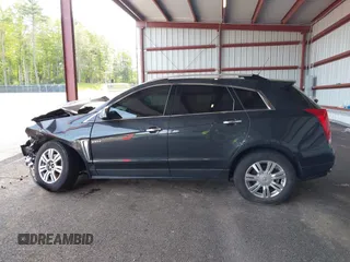 2016 Cadillac SRX Luxury Collection z VIN 3GYFNEE39GS555747, wystawiony jako IAAI lot #42347516 z przebiegiem 143 061 mil mil oraz . Historia ofert i sprzedaży dostępna na DreamBid. Obrazek 15.